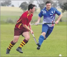  ??  ?? PUSHING FORWARD: Marcus Williamson of Warrack Hoops looks to clear the ball while under pressure from Mathew Mcdonald of Kaniva Cobras. Picture: SIMON KING