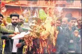  ?? ANI ?? BJP supporters burn an effigy of Punjab CM Charanjit Singh Channi in Bikaner on Thursday.
