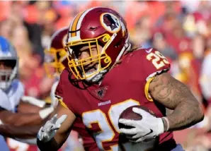  ?? Associated Press ?? Washington running back Derrius Guice is out of a job after being arrested on domestic violence charges.