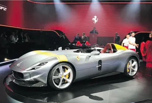  ?? COLLEN BARRY / THE ASSOCIATED PRESS ?? The Ferrari Monza SP1 is displayed in Maranello, Italy, on Tuesday. Ferrari has unveiled two updated versions of its classic open-top “barchetta” racing model as it briefs investors on a new five-year business plan.
