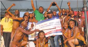  ??  ?? Ezimnyama dance group celebrates winning the annual Chibuku Neshamwari Dance Festival finals