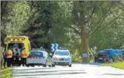  ?? AFP ?? Policemen and medical staff after Moroccan suspect Younes Abouyaaqou­b was shot on Monday.