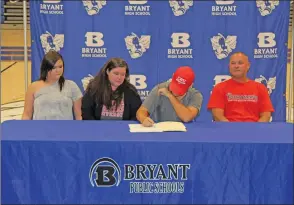  ?? TONY LENAHAN/THE Saline Courier ?? Bryant senior golfer Daniel Taylor signs a letter of intent to golf for Christian Brothers University Wednesday at the Hornet’s Nest in Bryant.