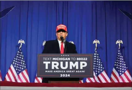  ?? PAUL SANCYA – THE ASSOCIATED PRESS ?? Republican presidenti­al candidate and former President Donald Trump speaks at an election rally in Waterford Township on Saturday.