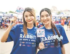  ?? ?? Rabbit Girls emceeing for social media before BG Pathum United FC’s Thai League 1 football match against Sukhothai at BG Stadium in Pathum Thani.