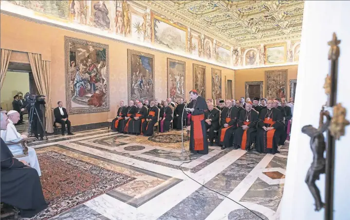  ?? Vatican Media ?? Cardinal Kurt Koch, president of the Pontifical Council for Promoting Christian Unity, addresses Pope Francis during the council’s plenary meeting on Friday in Rome. Cardinal Donald W. Wuerl of Washington, a member of the council, is seated to the right of Cardinal Koch.