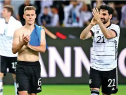  ?? ?? Joshua Kimmich (left) began the rout by opening the scoring for Germany