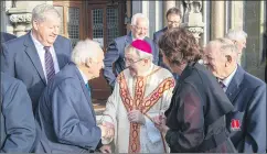  ?? (Pic: Denis O’Flynn) ?? Denis Hurley, Sarsfields, the oldest surviving officer, meets Bishop of Cloyne, William Crean following the celebratio­n of a special East Cork GAA centenary Mass in Cobh catherdral.