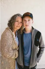  ?? ?? Kathy Stainbrook (left) with her son Caleb. Stainbrook, who helped with the recall, says the pandemic restrictio­ns in schools were what disturbed her most.