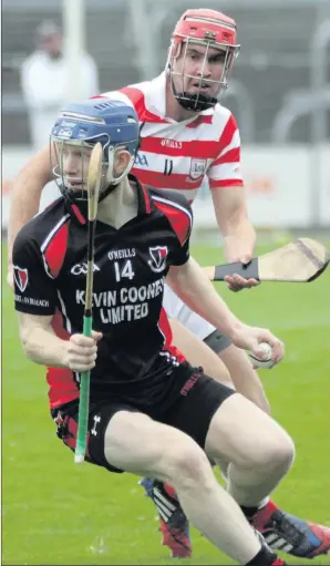  ??  ?? Paul Morris of Ferns St. Aidan’s keeps a close on eye on county colleague Rory Jacob (Oulart-The Ballagh) in Sunday’s ACHL Division 1 decider in Wexford Park.
