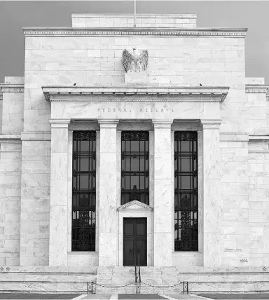  ?? KAREN BLEIER / AFP / Gett y Imag es / file ?? The U.S. Federal Reserve building: Treasuries have become more perilous for bond invest
ors as the strength of the U.S. economy bolsters the Fed’s case for raising interest rates.