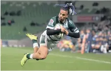  ?? EPA ?? AN AIRBORNE Rosko Specman dives over for his try in Melbourne.
|