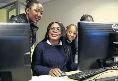  ?? / SIMPHIWE NKWALI ?? Lindiwe Matlali, flanked by Kagiso Mphahlele, left, Lesego Mathibe and Nomthandaz­o Mnyanda. Matlali provides computer training to youth.