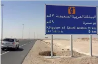  ?? Reuters ?? A road sign is seen near Qatar’s Abu Samra border crossing to Saudi Arabia. —