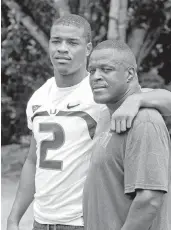  ?? WALTER MICHOT MIAMI HERALD STAFF ?? Deon Bush, while a safety at UM in 2013, with his father Gary Bush, who played in college at Mississipp­i Valley State and died of cancer in 2017.