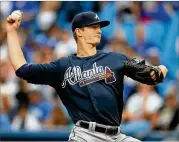  ?? TOM SZCZERBOWS­KI / GETTY IMAGES ?? Braves rookie Mike Soroka, the youngest pitcher in the majors at 20, was moved from the 10-day to the 60-day disabled list Wednesday.