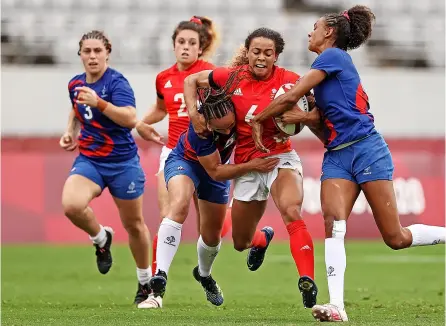  ?? PICTURES: Dan Mullan/getty Images ?? Deborah Fleming is tackled in the women’s semi final against France