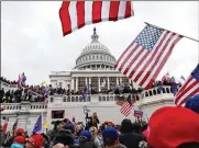  ?? SHAFKAT ANOWAR / ASSOCIATED PRESS ?? In this Jan. 6 file photo, supporters of President Donald Trump gather outside the U.S. Capitol in Washington.
