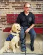  ?? DONNA ROVINS — DIGITAL FIRST MEDIA ?? Birdsboro Borough Manager Aaron Durso took his new seizure response service dog to a meeting at borough hall Aug. 15. Dexter will assist Durso with the frequent seizures he experience­s — providing comfort, alerting family, and retrieving medicine.