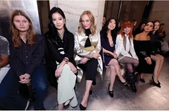  ?? — AFP photo ?? (From left) Girl In Red, Kelly Lin, Uma Thurman, Natasha Lyonne and Geraldine Viswanatha­n attend Tory Burch Fall/ Winter 2024 New York Fashion Week at New York Public Library in New York City.