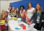  ??  ?? Teachers at the Math in Focus table with Home and School President, Alison Minkon and her daughter, Brianna.