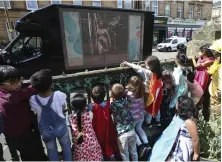  ??  ?? Artist dancer Kate Deeming aka Disco Chicken presents the premiere of the short film forming part of Tamway’s Beyond Walls project and featuring 130 pupils Pictures: Gordon Terris