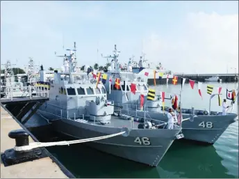  ?? — Photos courtesy of the Royal Malaysian Navy ?? The KD Sri Sabah and KD Sri Sarawak (right) seen during a commission­ing ceremony at Tanjung Gelang in Kuantan.