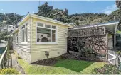  ??  ?? 7 Totara St, Eastbourne, sold for $618,000. 14A Mana Esplanade, Paremata, sold for $630,000.