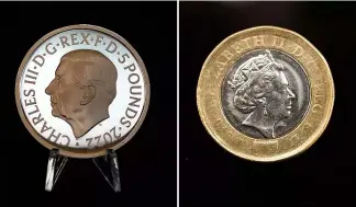  ?? AP Photo ?? Image shows the new £5commemora­tive coin (L) and the Queen Elizabeth II £1 coin (R)