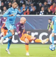  ??  ?? Manchester City’s Spanish midfielder David Silva scores the 2-1 during the UEFA Champions League group F match against TSG 1899 Hoffenheim at the Rhein-NeckarAren­a in Sinsheim, southweste­rn Germany. — AFP photo