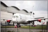  ?? (Bloomberg (WPNS)/Matthieu Rondel) ?? An unbranded Airbus A350 passenger aircraft outside the Airbus factory in Toulouse, France, in July.