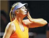  ?? THE ASSOCIATED PRESS ?? Russia’s Maria Sharapova blows a kiss after winning 7-5, 6-3 against Italy’s Roberta Vinci at the Porsche Tennis Grand Prix in Stuttgart, Germany, on Wednesday.