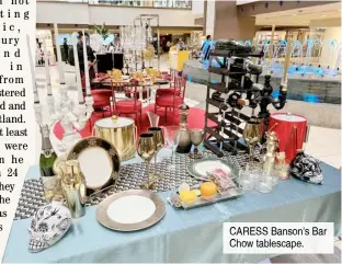  ?? ?? CARESS Banson's Bar Chow tablescape.