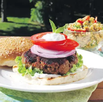  ??  ?? The patty in this kofta burger is made from a richly spiced ground lamb mixture. The light and almost refreshing-tasting tabbouleh makes a nice side dish.