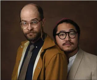  ?? CHRIS PIZZELLO/THE ASSOCIATED PRESS ?? Daniel Scheinert, left, and Daniel Kwan, the directing duo known as the Daniels, pose for a portrait at the 95th Academy Awards Nominees Luncheon on Feb. 13 at the Beverly Hilton Hotel in Beverly Hills.