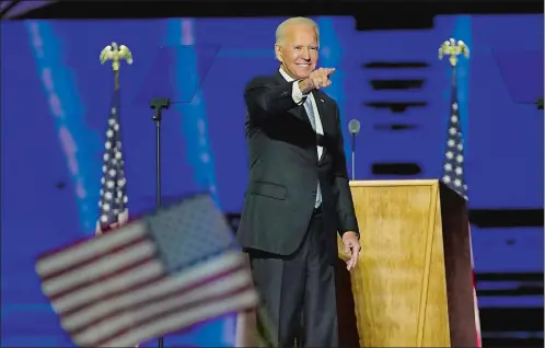  ?? ANDREW HARNIK/ AP PHOTO ?? President- elect Joe Biden speaks Saturday in Wilmington, Del., after his election victory against President Donald Trump was assured.