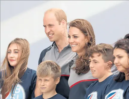  ??  ?? ROYAL APPOINTMEN­T: The Duke and Duchess of Cambridge meet members of the 1851 Trust charity. Picture: Chris Jackson