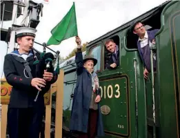  ?? ANDREW PM WRIGHT ?? Penny Pegler waves off the first Flying Scotsman service from Swanage on Saturday, October 22.