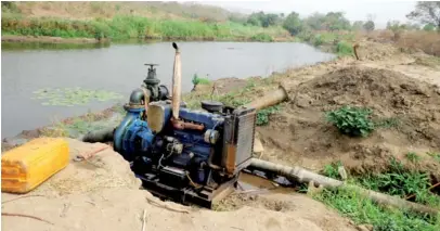  ??  ?? One of the several machines pumping water to farms at Osin irrigation area