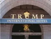  ?? MARK TENALLY/AP ?? An entrance of the Trump Internatio­nal Hotel in Washington, which is owned by the government.