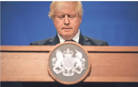  ?? FOTO: DANIEL LEAL-OLIVAS/AFP ?? Augen zu und durch: Premiermin­ister Boris Johnson setzt auf Aufhebung aller Lockerunge­n. Ein Kurs, der bei vielen Briten auf Kritik stößt.