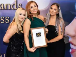  ??  ?? Award winning Lesley McBride, Chlöe Boyd and Kim Simpson pick up the award for best beauty salon at the Renfrewshi­re Business Awards last December
