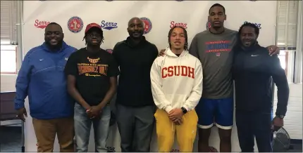  ?? PHOTO COURTESY OF SERRA HIGH ?? Serra's signing day ceremony on Monday included, from left, Serra baseball coach A.J. Perry, Delton Prinze II, Athletic Director Richard Jenkins, basketball players Jeremy Dent-Smith and Amir Gipson, and basketball coach Bernard McCrumby.