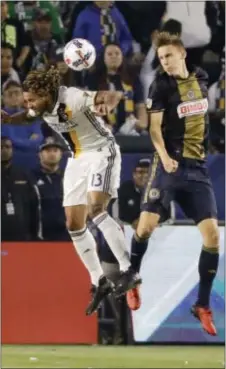  ?? CHRIS CARLSON — THE ASSOCIATED PRESS ?? Union defender Jack Elliott, right, engages LA Galaxy midfielder Jermaine Jones in an aerial battle for the ball during Saturday’s scoreless draw in Carson, Calif.