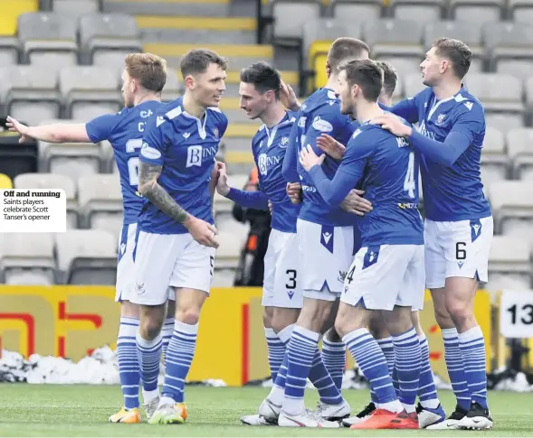  ??  ?? Off and running Saints players celebrate Scott Tanser’s opener