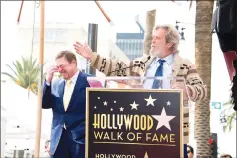  ??  ?? Goodman reacts as Bridges speaks at Goodman’s star unveiling ceremony on the Hollywood Walk of Fame, on Friday, in Hollywood, California. (Right) Actor Tom Hiddleston (left to right), Goodman and Larson attend the ceremony. — AFP photos