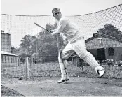  ??  ?? ‘I’d much rather have stayed in the Navy, frankly’: the young Philip Mountbatte­n during cricket practice while in the Royal Navy in 1947