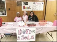  ?? PHOTO PROVIDED ?? Members of the Highland High School junior varsity volleyball team conducted a bake sale during the varsity team’s match against New Paltz on Oct. 7.