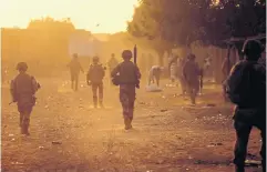  ?? AFP ?? French soldiers patrol the streets of Gao in December last year. France entered Mali in 2013 to stop al-Qaeda-linked militants from advancing toward Bamako.