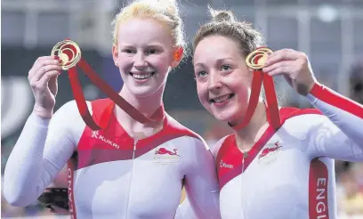  ?? Ryan Pierse / Getty Images ?? ●● Sophie Thornhill and Helen Scott celebrate after winning gold